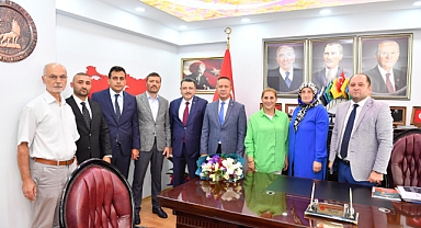 GENÇ, MHP'Yİ ZİYARET ETTİ