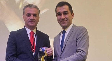 MUSTAFA BIYIK'A ÖDÜL