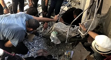 KATİL İSRAİL APARTMANI BOMBALADI:247 ŞEHİT